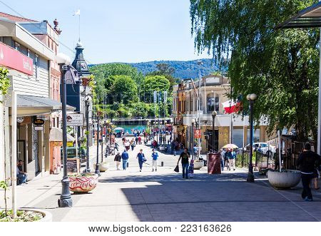 VALDIVIA, CHILE - OCTOBER 30, 2016: People walking down the pedestrian street Libertal in the center of Valdivia. This is the most beautiful and old part of the city.
