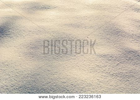 Background in the form of fresh fallen snow. Winter frosty morning. Copy space.