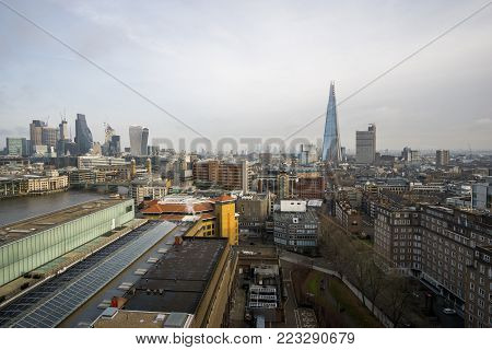 The Shard skyscraper with grey clouds in the sky