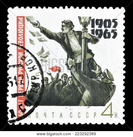 SOVIET UNION - CIRCA 1965 : Cancelled postage stamp printed by Soviet Union, that shows Demonstrator up on lamp post.