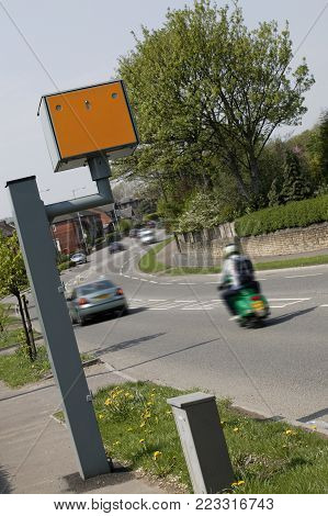 WEST YORKSHIRE, UK: VEHICLES BREAKING NEAR TO YELLOW GATSO SPEED CAMERA, 8TH MAY 2004, WEST YORKSHIRE, UK