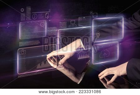 Male hands touching interactive table with purple cloudspace graphic on it 