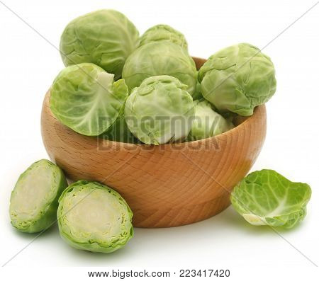 Rosenkohl Or Brussels Sprout In A Bowl Isolated Over White Background
