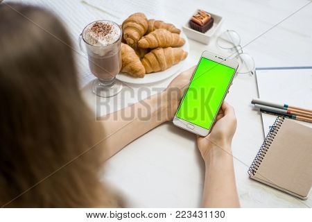 Beautiful Girl Holding A Smartphone In The Hands Of A Green Screen Green Screen, Hand Of Man Holding