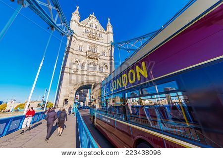 LONDON, UNITED KINGDOM - NOVEMBER 06: View of Tower Bridge with a London tourbus on November 06, 2017 in London