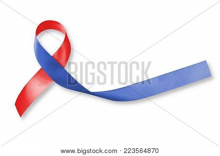 Red And Blue Ribbon Awareness On Woman Human Hand Aged Wood For Congenital Heart Defects Disease