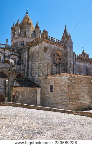 The view of Cathedral of Evora (Se de Evora) – a Roman Catholic church whose real name is Basilica Cathedral of Our Lady of Assumption. Evora. Portugal