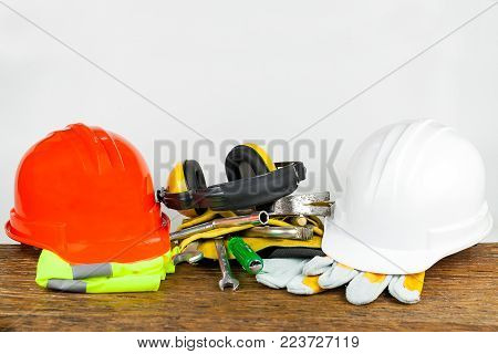 tools set and helmet  on wood planks.selective focus.