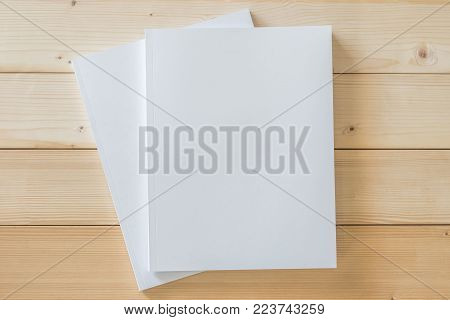 Two Blank A4 Size Book Cover Mockup Template With Page Front Side On White Surface On Wood Table