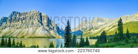 Panoramic view of  Mountains and Lake in Banff National Park, Rocky Mountains, Alberta, Canada.
