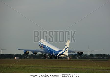 Amsterdam, the Netherlands  -  June 2nd, 2017: VQ-BLR AirBridgeCargo Boeing 747 taking off from Polderbaan Runway Amsterdam Airport Schiphol