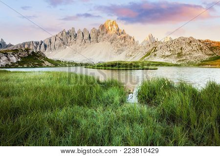 Alpine mountain lake at sunny morning, Tre Cime, Italian Dolomites