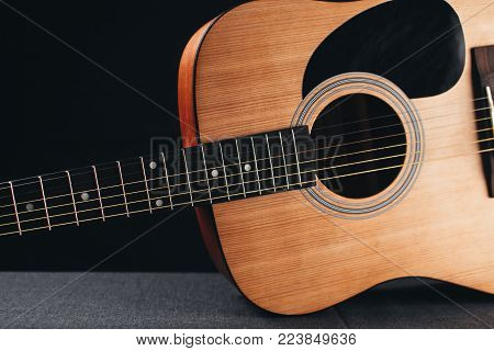 Part Of The Guitar, Neck, A Grey And Black Background, Beautifully, Elegantly