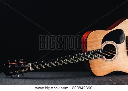 Part Of The Guitar, Neck, A Grey And Black Background, Beautifully, Elegantly