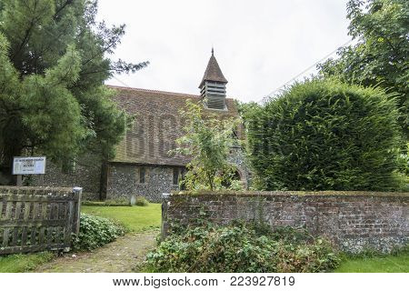 Footpath and entrance to Saint Margaret's Church in the village of Hucking, Kent, UK