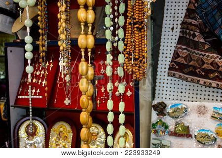 Religious objects sold in a souvenirs shop in the bazaar of the old city of Jerusalem in Israel January 13-2018 morning