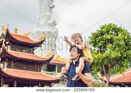 Happy Tourists Dad And Son In Pagoda. Travel To Asia Concept. Traveling With A Baby Concept