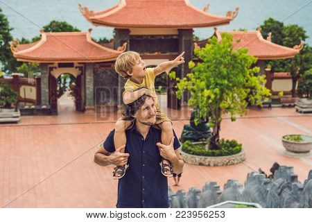 Happy Tourists Dad And Son In Pagoda. Travel To Asia Concept. Traveling With A Baby Concept