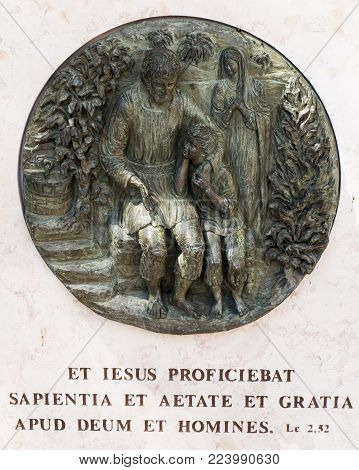 NAZARET, ISRAEL, July 8, 2015: Biblical scenes from the life of Jesus, bas-reliefs in the region of the Basilica of the Annunciation in Nazareth, Israel