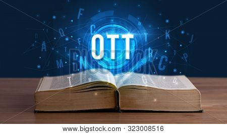 OTT inscription coming out from an open book, digital technology concept