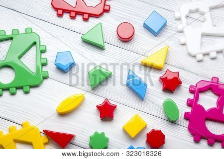 Kids Educational Developing Toys Frame On White Background. Top View. Flat Lay. Copy Space For Text