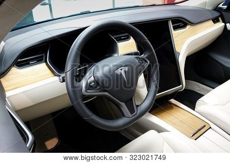 Seattle,wa/usa-9/15/29: A Tesla Car   Dashboard And Steering Wheel.  Tesla, Inc. Is An American Auto