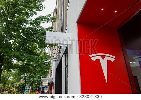 Seattle,wa/usa-9/15/29: The Exterior Of A Tesla Car  Dealership.  Tesla, Inc. Is An American Automot