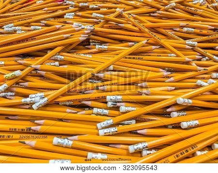 Moscow, Russia - August 23, 2018: Koh-i-noor Yellow Pencils Heap In A Supermarket. Top View. Mobile 