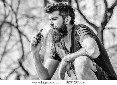 Bearded Man Smoking Vape. Smoking Electronic Cigarette. Smoking Device. Man Long Beard Relaxed With 