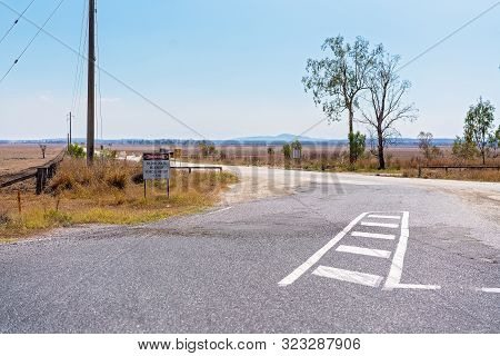 A Country Road Covered In Lime From A Nearby Quarry As Trucks Cart To Cement Works