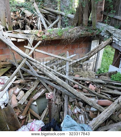 Ruins And Rubble Of An Old House Destroyed By The Terrible Earthquake