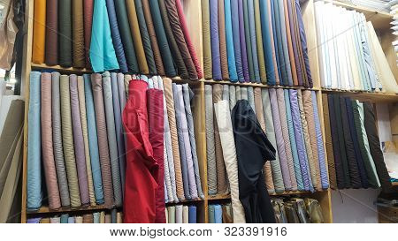 Cloth Shop With Clothing Rolls And Thaan, Kurta Shalwar Kapda