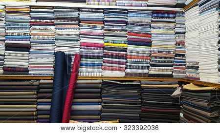 Cloth Shop With Clothing Rolls And Thaan, Kurta Shalwar Kapda