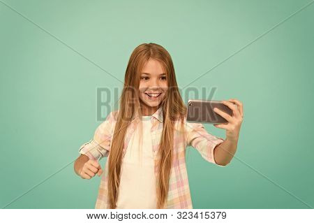 Video Call Concept. Girl Hold Smartphone Taking Selfie. Selfie For Social Networks. Streaming Online