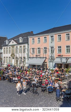 Lippstadt, Germany - March 22, 2019: People Enjoying The Sun At The Market Square In Lippstadt, Germ