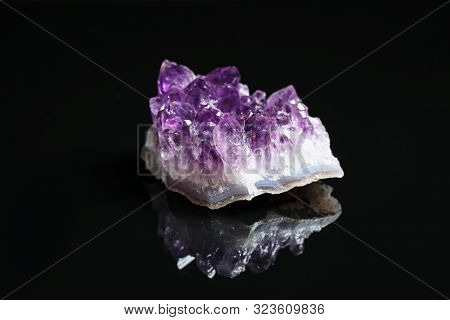 Beautiful Purple Amethyst Gemstone On Black Background
