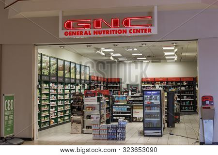 Kokomo - Circa September 2019: Gnc Health And Nutrition Retail Strip Mall Location. Harbin Pharmaceu