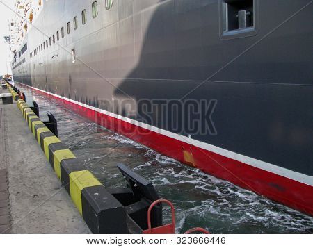 Cruise Liner Is Sailing Off The Pier Under Its Own Power, Auxiliary Thrusters Are Working