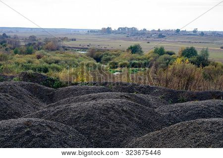 Industrial Background With Pile Of Gravel. Extraction Of Gravel. Construction Of Roads. Piles Of Gra