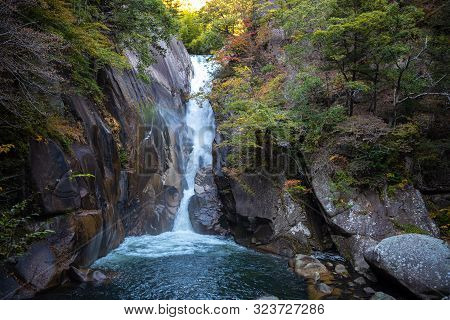 Senga Waterfall ( Sengataki ), A Waterfall In Mitake Shosenkyo Gorge. Autumn Foliage Scenery View In