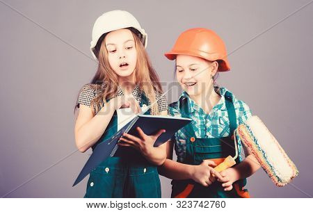 Kids Choosing Paint Colour For Their New Room. Children Sisters Run Renovation Their Room. Amateur R