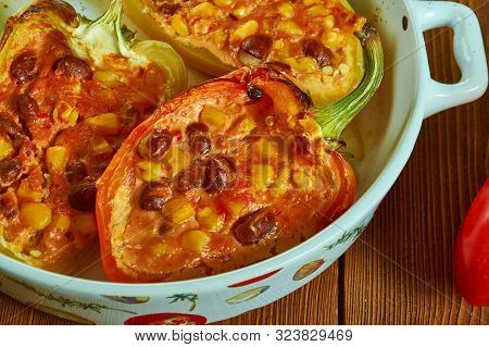 Chili Stuffed Spaghetti Bell Peppers , Oasted Spaghetti Squash Filled With A Hearty Two-bean Vegetab