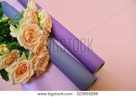 Concept Of Flower Salon. Photo For The Flower Website. Packing Material For Flowers. Rose Bushes On 