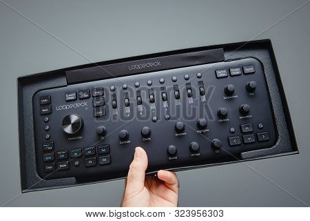 Paris, France - Sep 20, 2019: Man Hand Holding Against Gray Background New Loupedeck Plus Photo And 