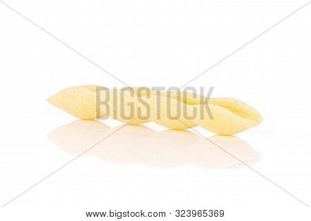One Whole Uncooked Pasta Cavatelli Isolated On White Background