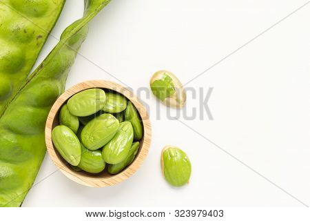 Sato Seeds, Bitter Bean In The Wooden Bowl Isolated On White Background, Thai Vegetable Food