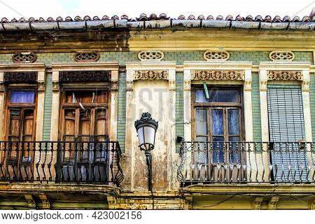 Colorful Facades Of Old Buildings In The Cabanyal Neighborhood In Valencia, Spain