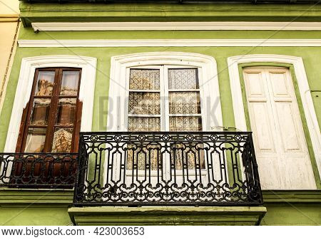 Colorful Facades Of Old Buildings In The Cabanyal Neighborhood In Valencia, Spain