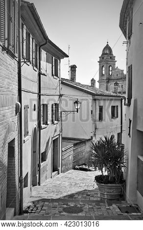 Old street in Santarcangelo di Romagna town in Rinini Province, Emilia-Romagna, Italy. Italian scene, black and white photography