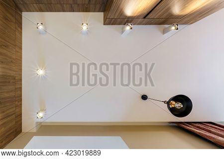 Suspended Ceiling With Led Diode Spots Lamps And Drywall Construction In Empty Room In Apartment Or
